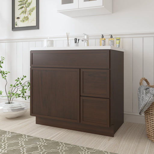 36-inch dark walnut bathroom vanity cabinet with white countertop, angled view in bright bathroom