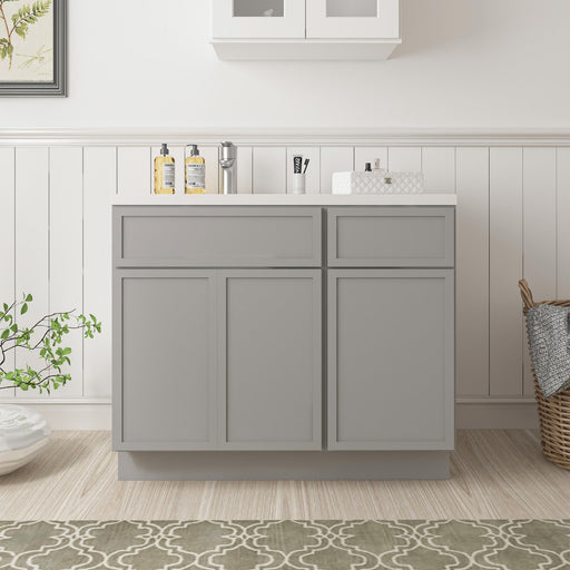 39-inch gray painted bathroom vanity cabinet with white sink top, front view in bathroom setting