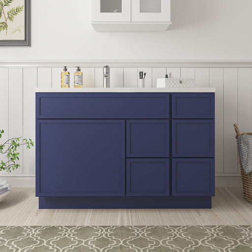 48-inch navy blue bathroom vanity cabinet with 5 drawers and 1 door, front view in bathroom