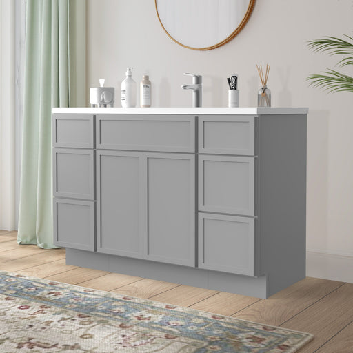 48 inch gray bathroom vanity cabinet angled side view with white sink top in bathroom setting
