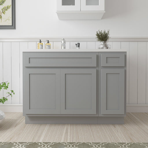 51-inch gray bathroom vanity cabinet front view with white sink top in styled bathroom