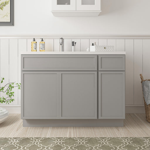 42-inch gray bathroom vanity cabinet without top, front view, shaker-style three doors and drawers, clean white bathroom