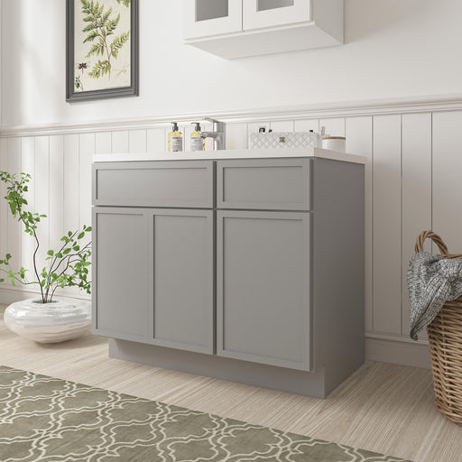 39-inch gray bathroom vanity cabinet angled view with white countertop in bright bathroom setting