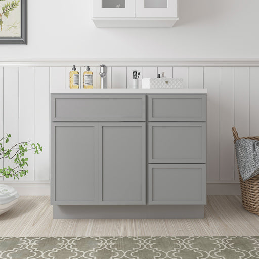 39-inch gray bathroom vanity cabinet with 1 door and 3 right-side drawers, white countertop, front view in styled bathroom