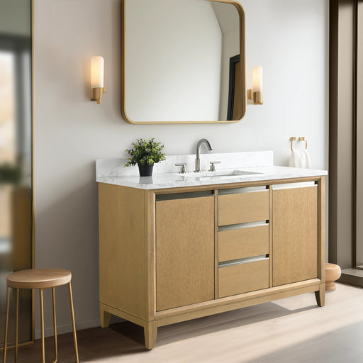 HomeBeyond 48-inch natural oak bathroom vanity with white marble top and brushed nickel faucet in warm-lit setting