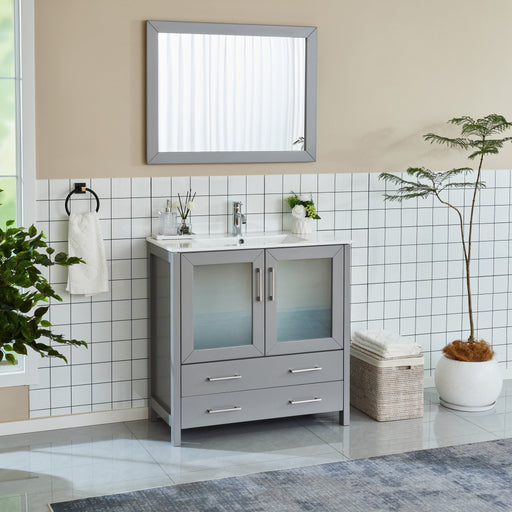 Brescia 36 inch gray single sink bathroom vanity with frosted glass doors and framed wall mirror, side angle view