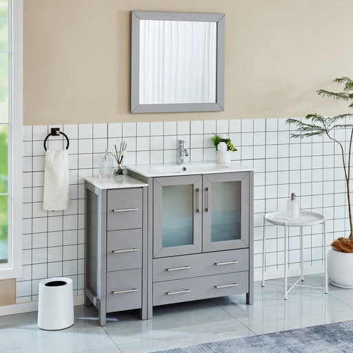 Brescia 42-inch gray bathroom vanity with frosted glass doors, integrated sink, and matching framed mirror