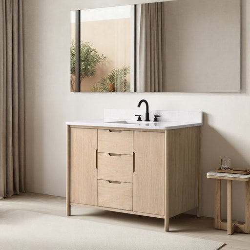48-inch light oak single-sink vanity with white quartz top and matte black faucet, angled lifestyle room view