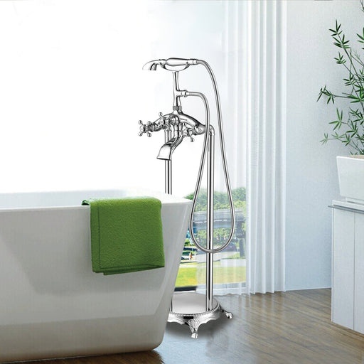HomeBeyond VA2019 chrome floor mounted tub filler with cross handles and green towel next to white soaking tub