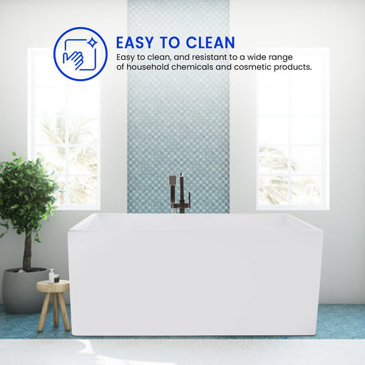 HomeBeyond white freestanding bathtub in spa-style bathroom with easy-to-clean acrylic surface and chrome floor-mount faucet