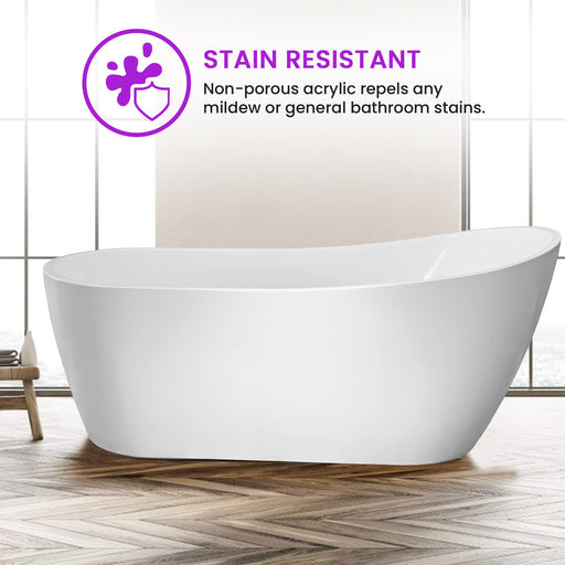 Stain-resistant non-porous white acrylic freestanding soaking tub in bright bathroom with herringbone wood floor
