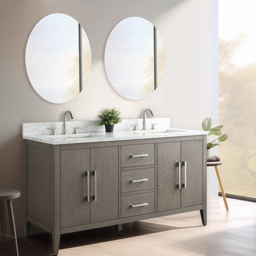 HomeBeyond 60-inch double sink bathroom vanity in gray oak with brushed nickel faucets and oval mirrors in bright bathroom setting