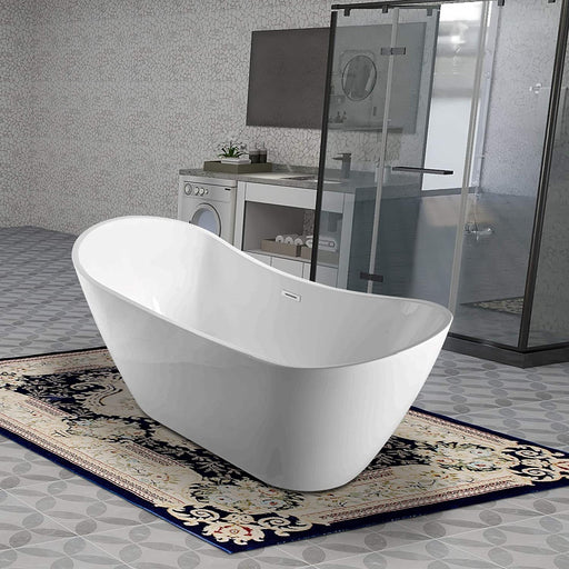 HomeBeyond 71x29 white freestanding acrylic bathtub in modern bathroom with glass shower enclosure and patterned area rug