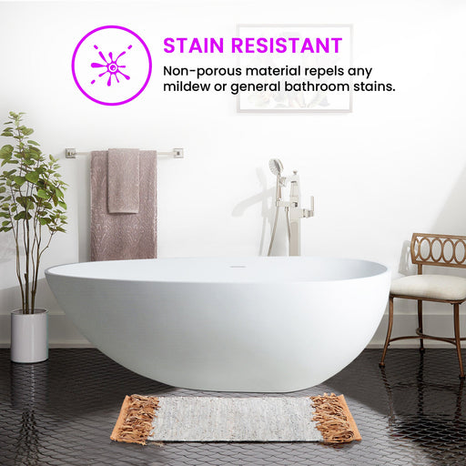 HomeBeyond white freestanding resin stone bathtub stain resistant non-porous surface on black hexagon tile floor