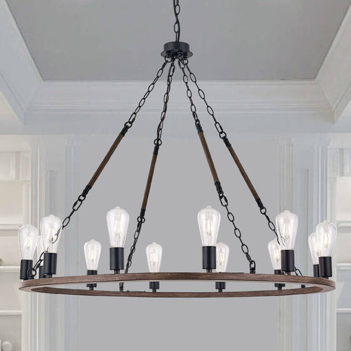 12-light black and walnut wagon wheel chandelier in formal entryway with tray ceiling